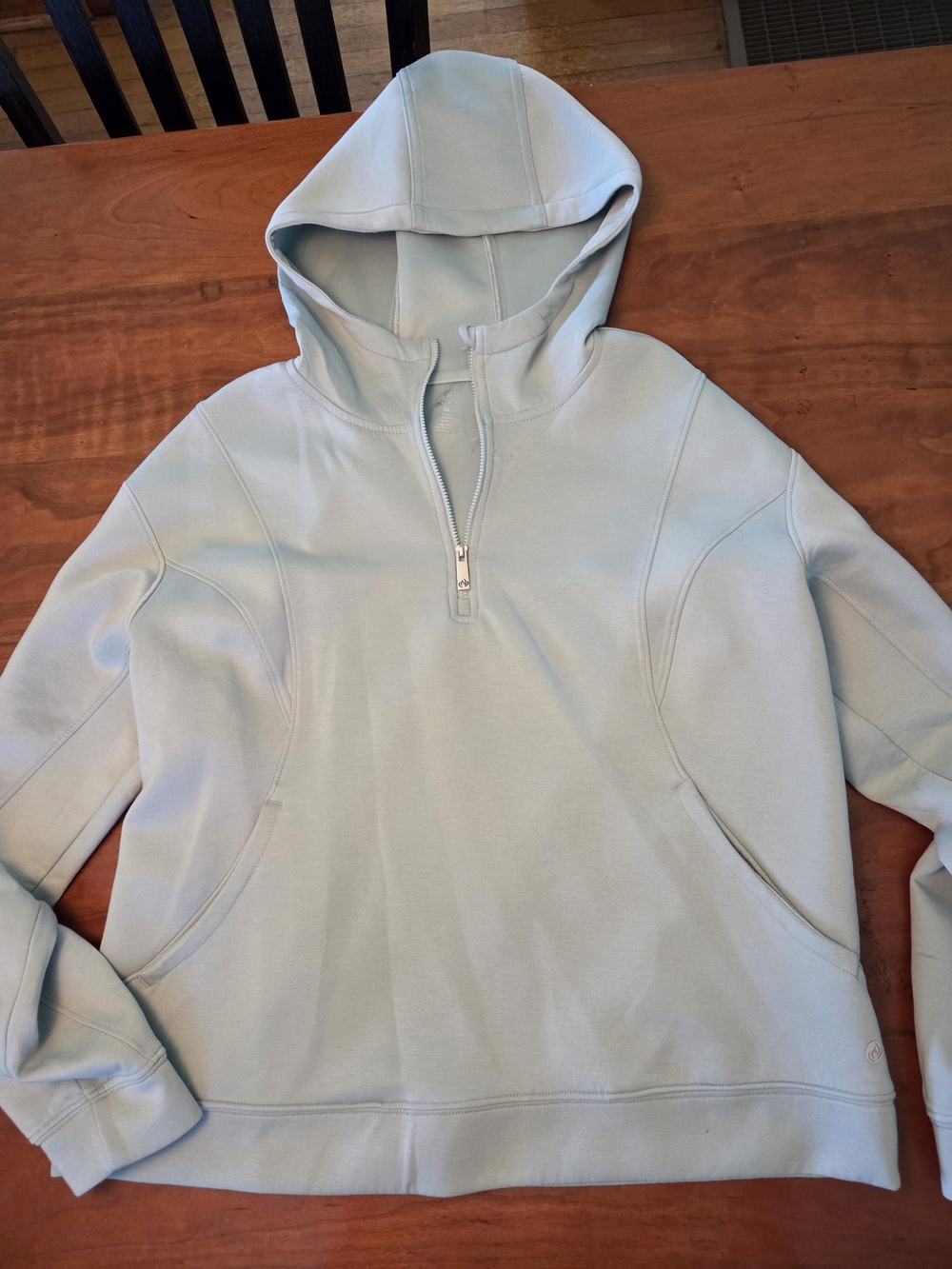 Apana Womans's Pale Blue Half-Zip Hooded Sweatshirt.